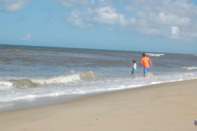 Scorch and his cousin dodging waves. 